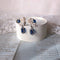 <05004>White rose and royal blue pierced earrings