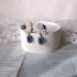 <05004>White rose and royal blue pierced earrings