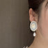 <05007>White rose cameo-style clip earrings