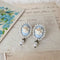 <05008>White rose cameo-style pierced earrings