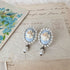 <05008>White rose cameo-style pierced earrings