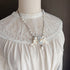 <05022>White rose cameo ribbon necklace