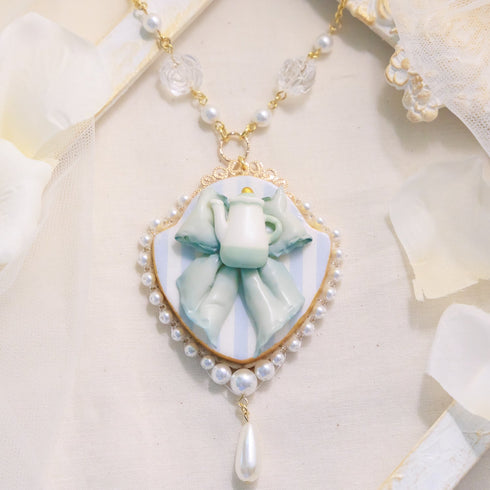 <06007>Ribbon and Teapot Necklace, Saxony Blue