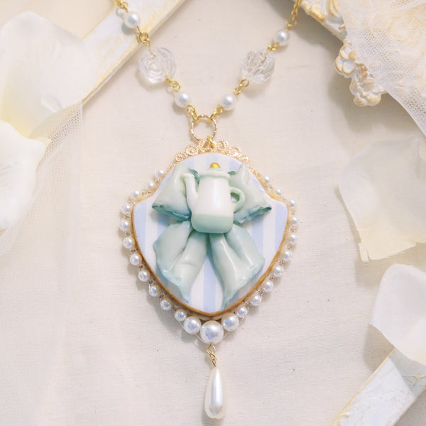 <06007>Ribbon and Teapot Necklace, Saxony Blue
