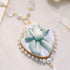 <06007>Ribbon and Teapot Necklace, Saxony Blue