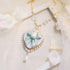 <06007>Ribbon and Teapot Necklace, Saxony Blue