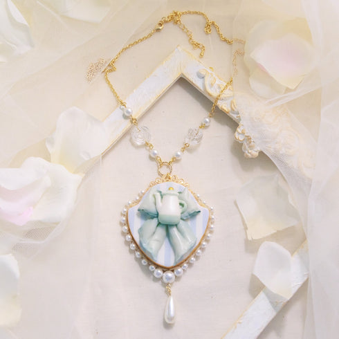 <06007>Ribbon and Teapot Necklace, Saxony Blue