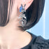 <06074>退廃的なうさぎと煌めくビジューピアス(ブルー)