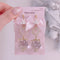 <09015>Rabbit Earrings ClearWhite Strawberry