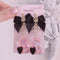 <09025>A black heart and a bear Earrings