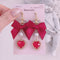 <09027>Red ribbon and swan Earrings