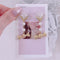 <09066>Clear Heart&candy Clip-On Earrings