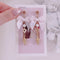 <09071>White ribbon and soft serve ice cream Clip-On Earrings