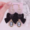 <09084>Black ribbon and cameo Clip-On Earrings