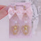 <09090>A bear inside a heart Clip-On Earrings(Pink)