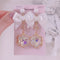 <09095>White ribbon and snowflake Clip-On Earrings