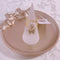 <09166>Gold Color Lace Ring Clear×Butterfly