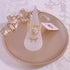 <09168>Gold Color Lace Ring Clear×Ribbon