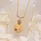 <10051>clown cream puff necklace(pink stone)