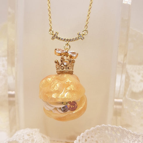 <10052>clown cream puff necklace(purple stone)
