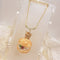 <10053>clown cream puff necklace(green stone)
