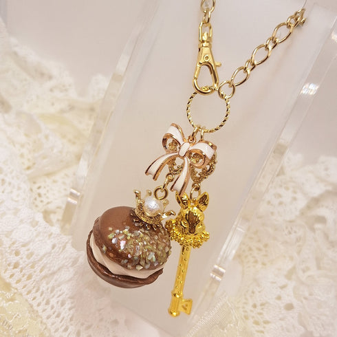 <10086>clown macron rabbit key charm (cocoa x rainbow)