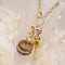 <10086>clown macron rabbit key charm (cocoa x rainbow)