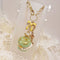 <10089>clown macron rabbit key charm gold print(green)