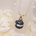 <10092>dark crystal clown macron necklace(2 blue stone)