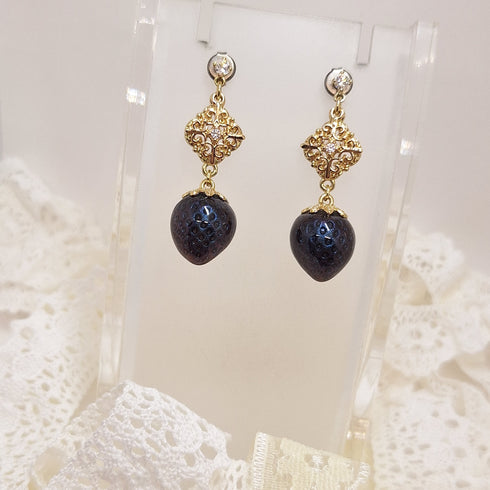 <10098>dark strawberry cross charm earrings