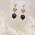 <10098>dark strawberry cross charm earrings