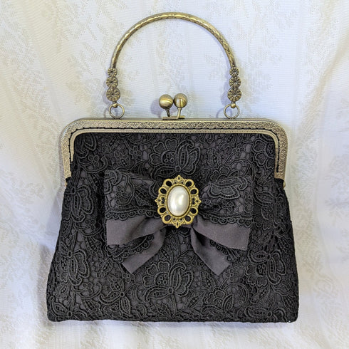 <35010>黒レースがま口バッグ 金具ハンドル